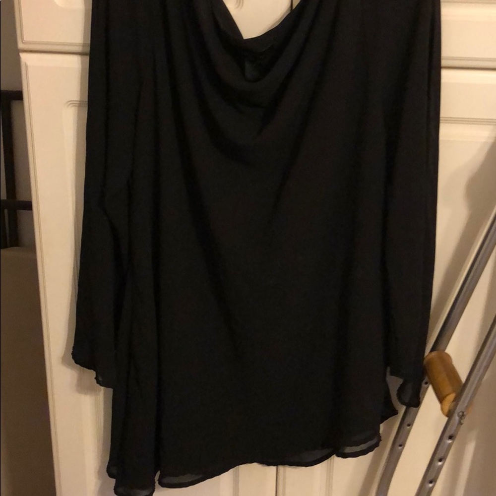 It’s a nice black dress shirt never worn